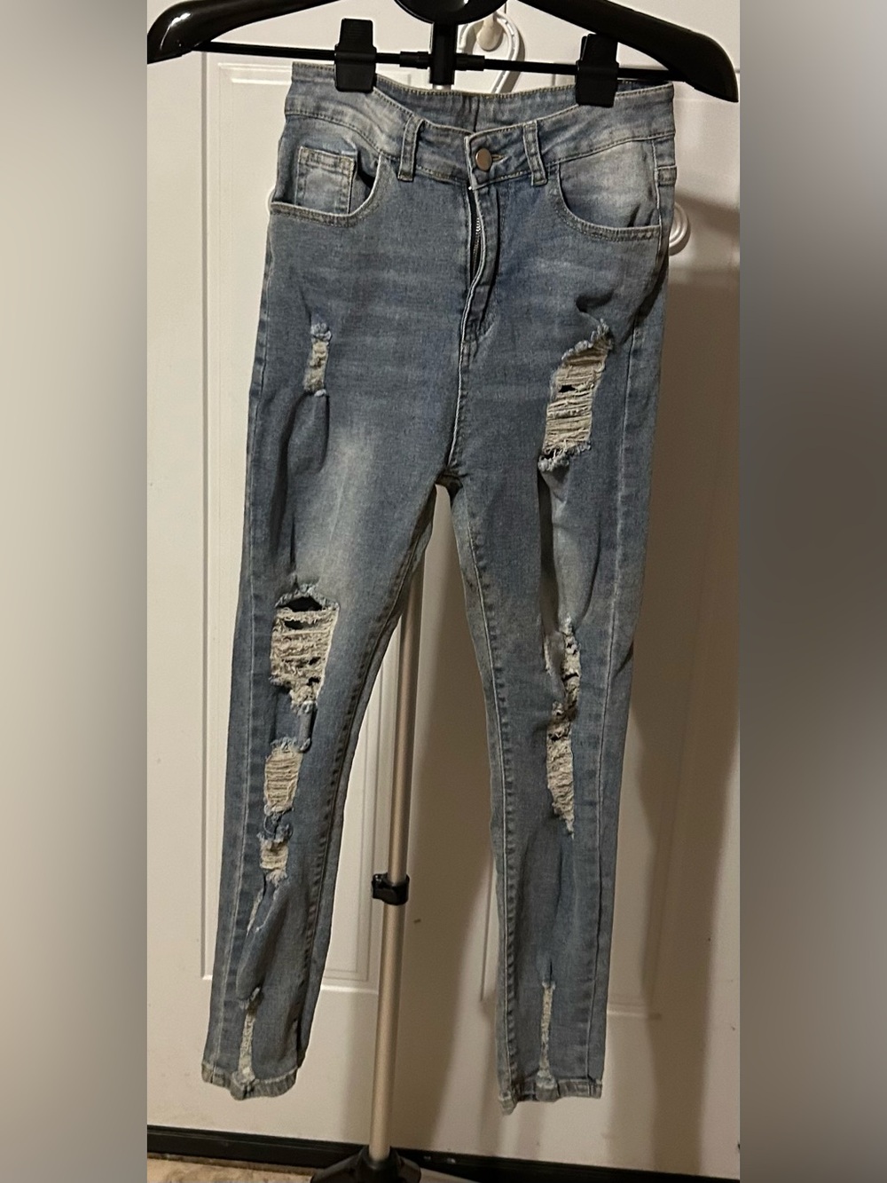 Woman’s Distressed High-Rise Skinny Jeans - Blue Size S